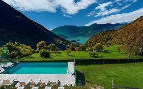 In A Green And Relaxing Atmosphere With Pool And Stunning Lake View